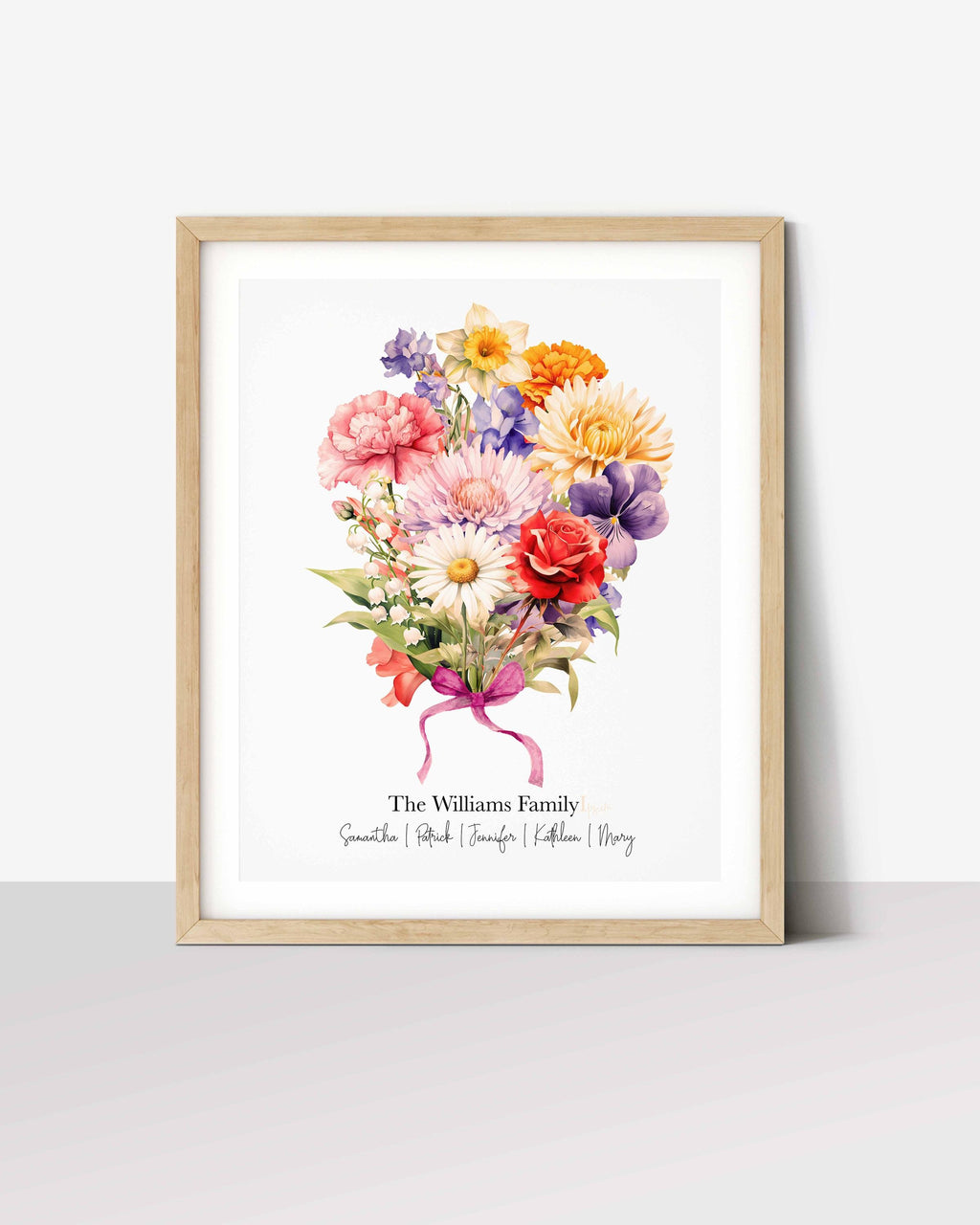 Ribbon-tied birth flower bouquet print on white with the family name and names, in a light wood frame