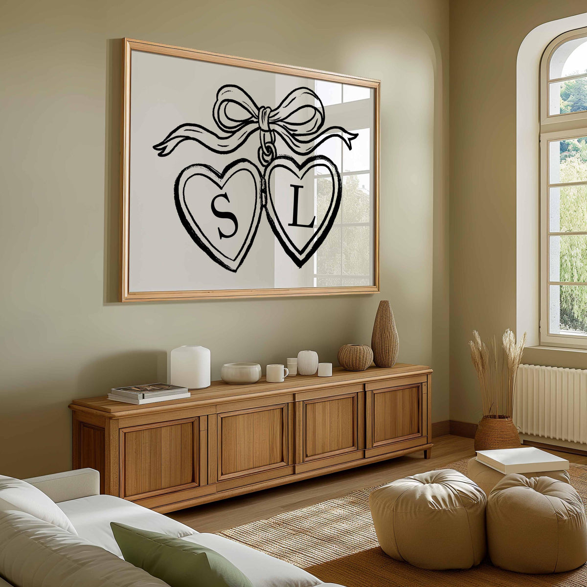 Heart locket couple print with initials S and L in two hearts tied with a bow, above a wooden sideboard Main image