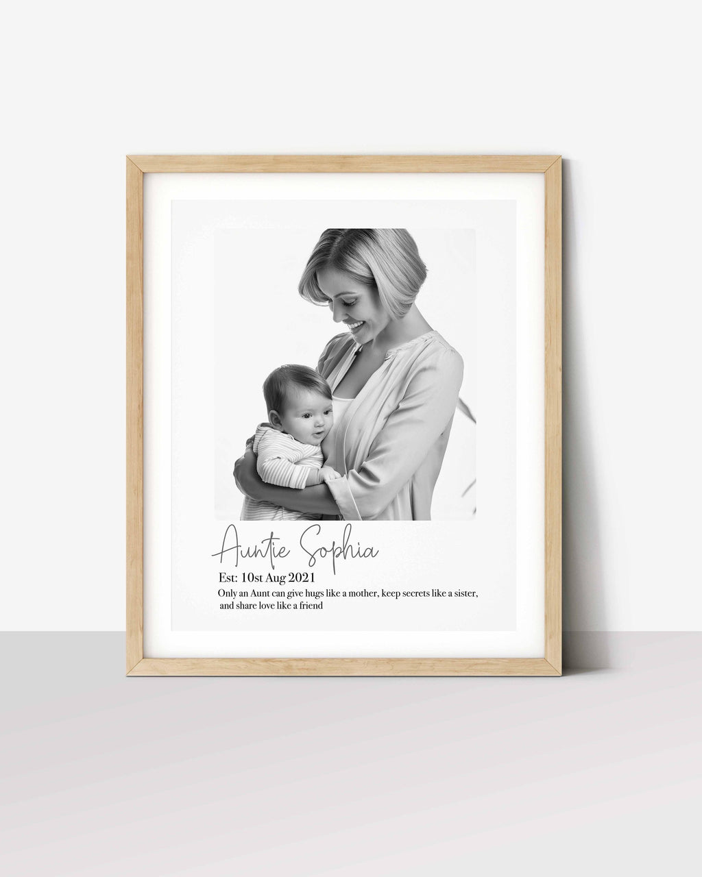 Personalized aunt gift print: black and white photo of Auntie Sophia holding a baby, with her name and a short quote