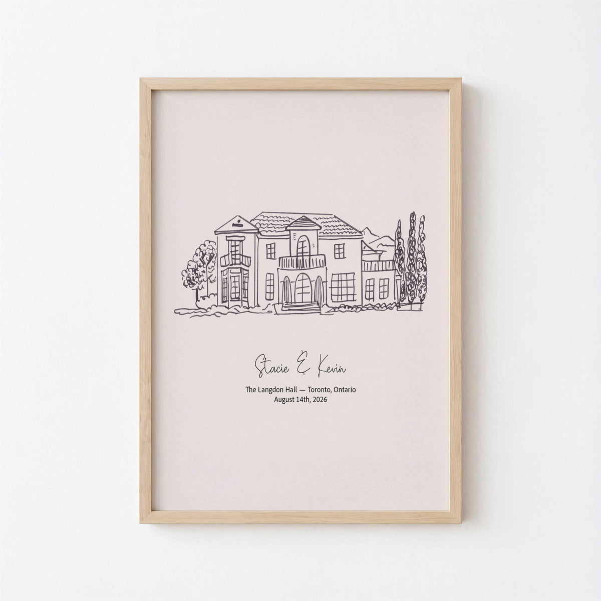 Framed hand-drawn wedding venue illustration with the couple's names, venue and date as an anniversary gift