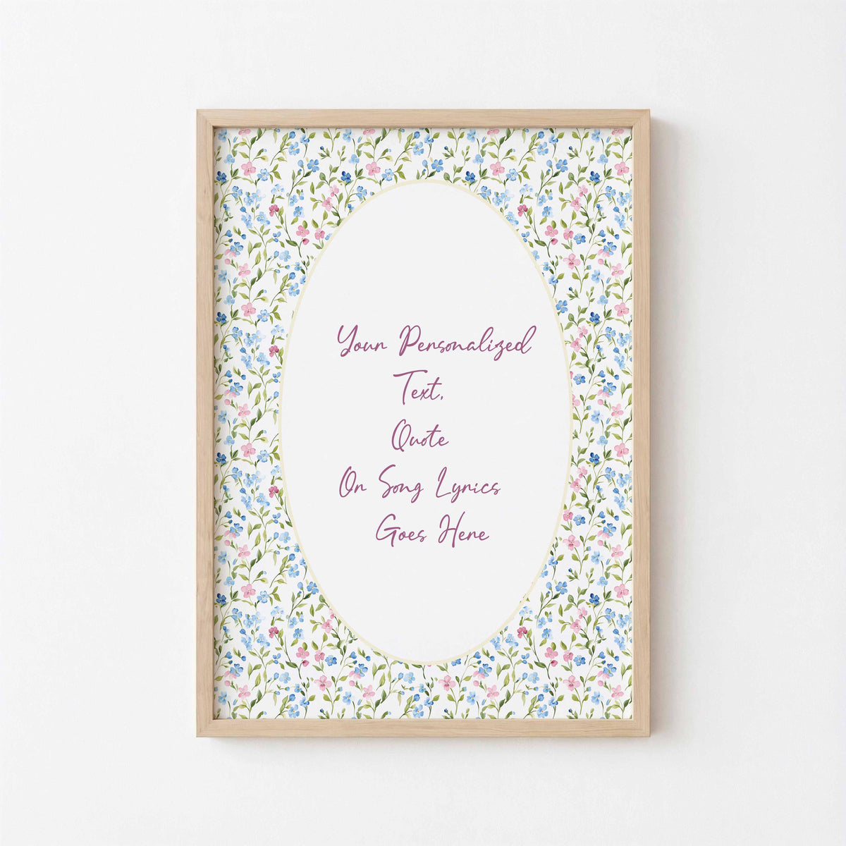 Floral custom lyric print: script text in an oval framed by pink and blue watercolour wildflowers