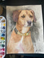 Custom pet portrait in watercolour of a brown dog wearing a Packers collar, beside a paint palette