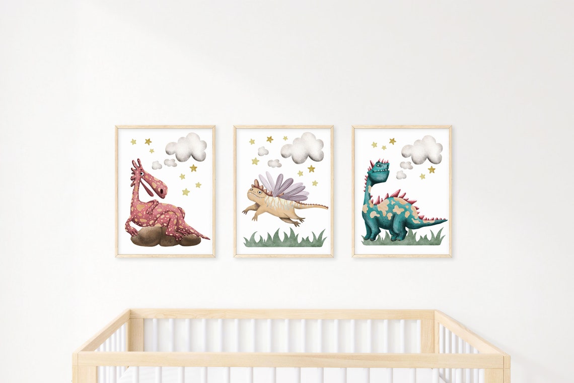 Three dragon prints in a row above a crib, a dragon flying under clouds in the middle